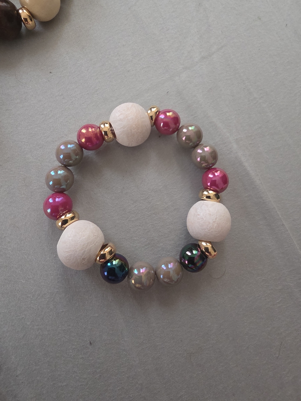 Handcrafted Multicolor Beaded Stretch Bracelet with Gold Accents